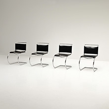 FOUR CHAIRS BY MIES VAN DER ROHE