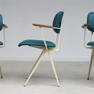 9 industrial 60s design chairs with wooden arm wrest from de Marko