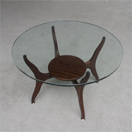 A 50s vladimir kagan style symmetric coffee table