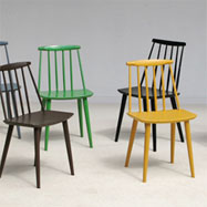 8 colorful playful chairs in the manner of Ilmari Tapiovaara