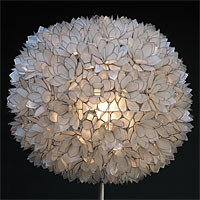 A 70s Flower Ball Floor lamp in Mother-of-Pearl and black Base