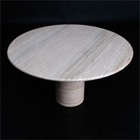Round travertine pedestal table in the manner of  Angelo Mangiarotti