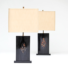 In the manner of Ado Chale pair of black Resin lamps