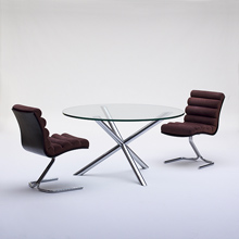 Sculptural dining Table with Four Star Chrome Base 