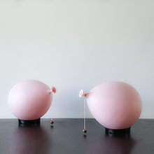 Pink table or wall lamps designed by Yves Christin