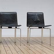 4 black leather Horst Bruning? chairs