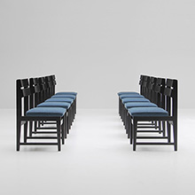 Ten black ebonized dinning chairs